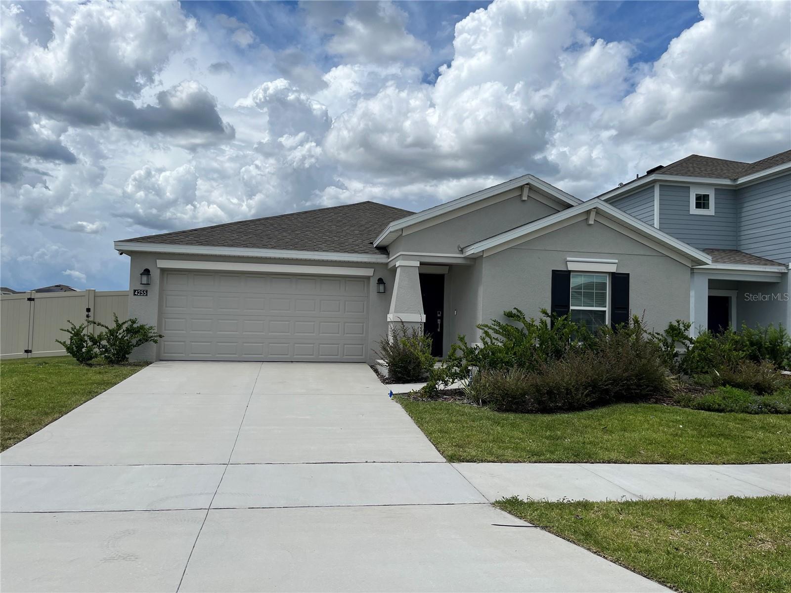 Located in the beautiful city of Kissimee, Stoney Creek is close to local schools, parks, restaurants. This 3/2 All Tiled like new home boasts an open concept floorpan. Don't wait to build, this oversized corner lot home is move in ready, including a complete vinyl fenced back yard. The community includes a pool, tennis, basketball, fitness center, playground, clubhouse, volleyball and walking paths. Pleasant Hill Elementary, Horizon Middle, Poinciana High. Close to SR 535, I-4, US 192. This move in ready home will not last!