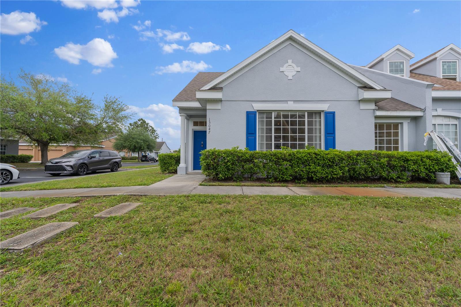 Move into this beautiful 3-bedroom, 2-bathroom one-story townhome in the gated community Island Walk. This end unit boasts a spacious and contemporary floor plan, ALL KITCHEN appliances have been installed as well as a washer and dryer, property features tile and laminate flooring, a renovated master bath shower, and abundant natural light throughout. With a two-car garage, and fresh interior and exterior paint. Conveniently located just minutes away from major highways such as the 417 and Florida Turnpike, as well as key destinations like Lake Nona, Orlando International Airport, the SunRail station, and various shopping and dining options, this townhome offers convenient living.