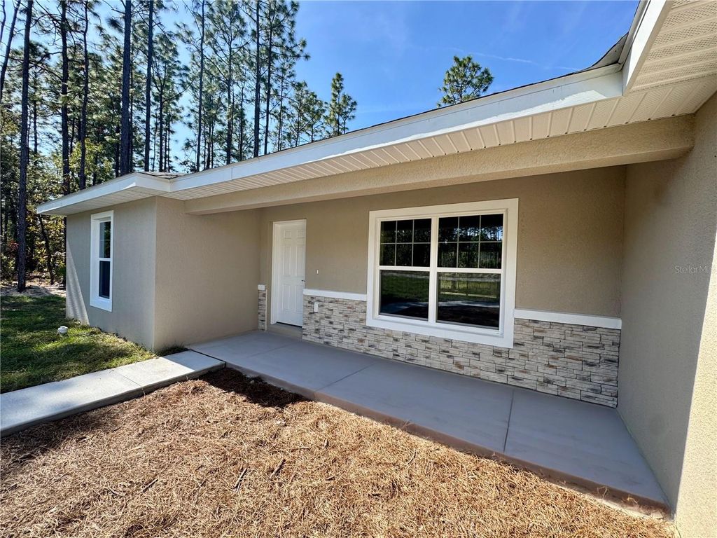Photo of 1540 E Artesian Lane, Dunnellon, FL 34434 (MLS # OM722829)