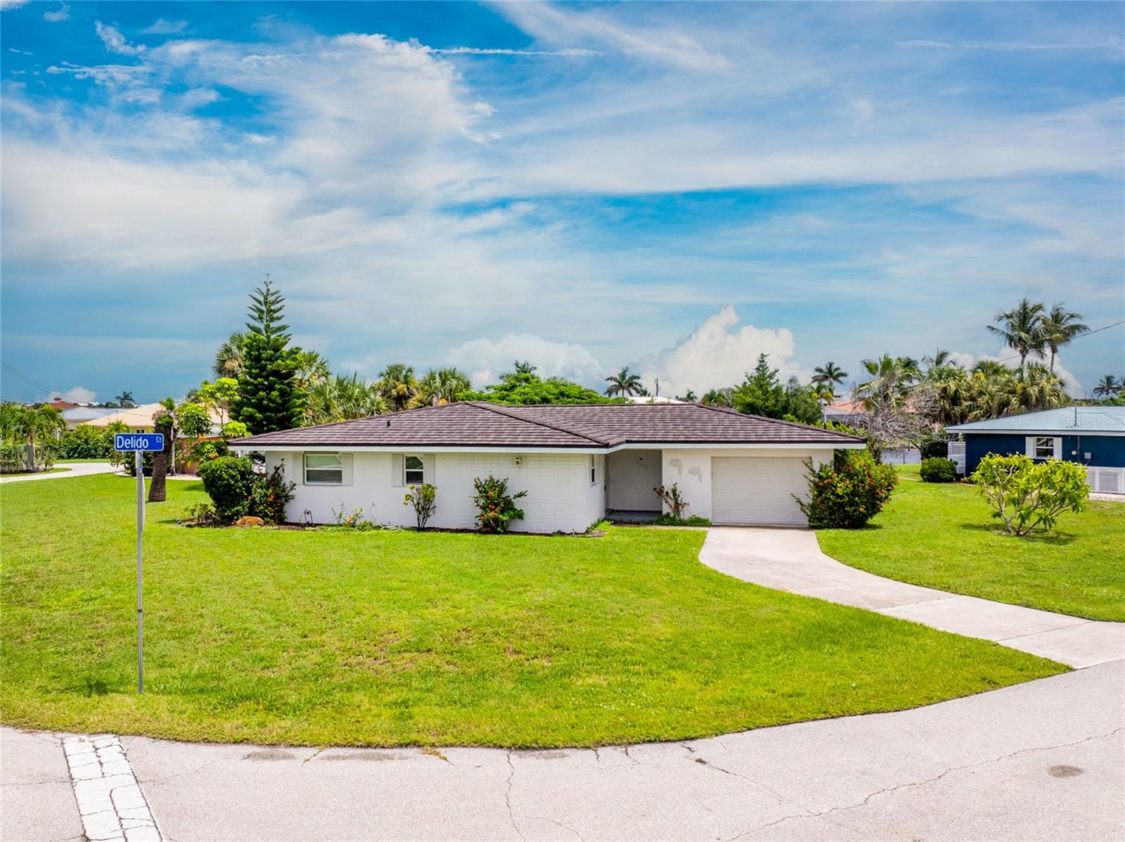 Priced Right in a Highly Sought after Location~3 Bedroom 2 Bath Waterfront Home In Punta Gorda Isles!! Freshly Modernized Kitchen and Baths, Ready for Your Story to Unfold! With Hurricane Protection and Neutral Tile Floors this Home Offers a Clean, Freshly Painted Interior—a True Blank Canvas Where You can bring Your Personality to Life!
Set on an Oversized lot with Southeast Canal Views, You’ll Enjoy 15 feet of Dock Space—Perfect for Fishing Dinner Right from Your Backyard or Hop on Your Boat for a Day on the Water. The kitchen’s pass-through window makes Entertaining Easy, Connecting Indoor living to the outdoors.
Just a short walk away, Discover the World-Famous Fisherman’s Village, where you can Relax on their Private Beach, Enjoy Waterfront Dining, Shop Charming Boutiques, or Indulge in a Scoop of Ice Cream! You’re also Soo close to Historic Downtown Punta Gorda and Charlotte Harbor’s Vibrant Waterfront Lifestyle. 10 Minutes to the airport and I-75.