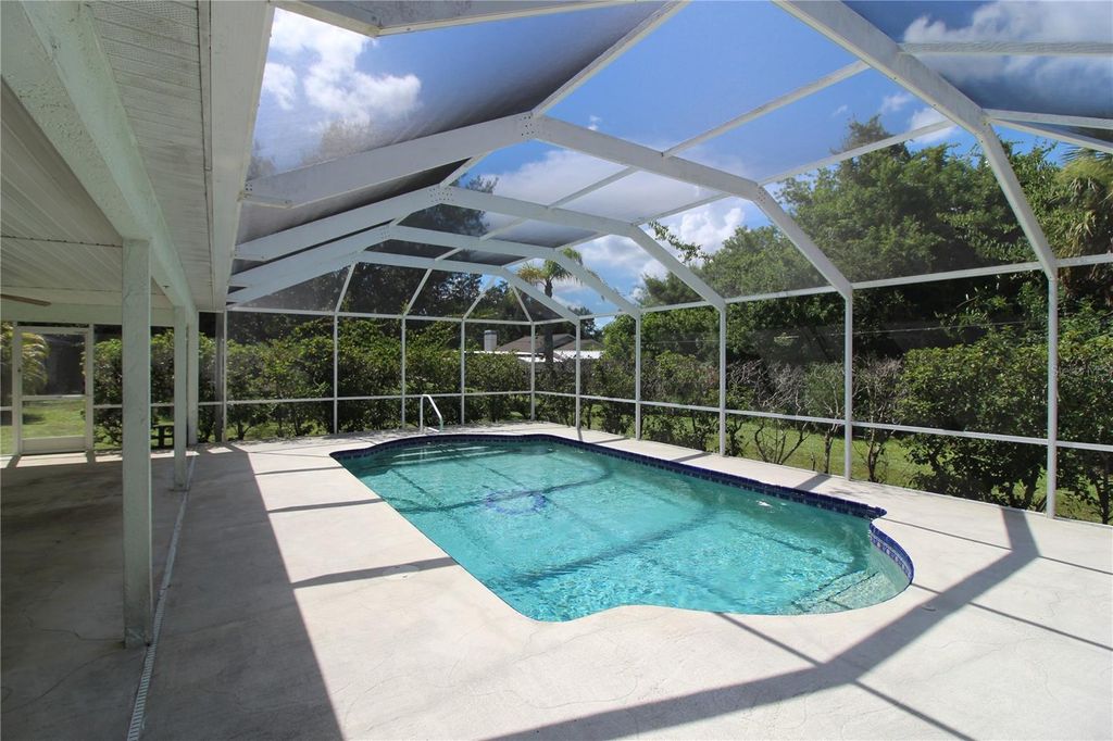 Photo of 21466 Quesada Avenue, Port Charlotte, FL 33952 (MLS # C7513188)