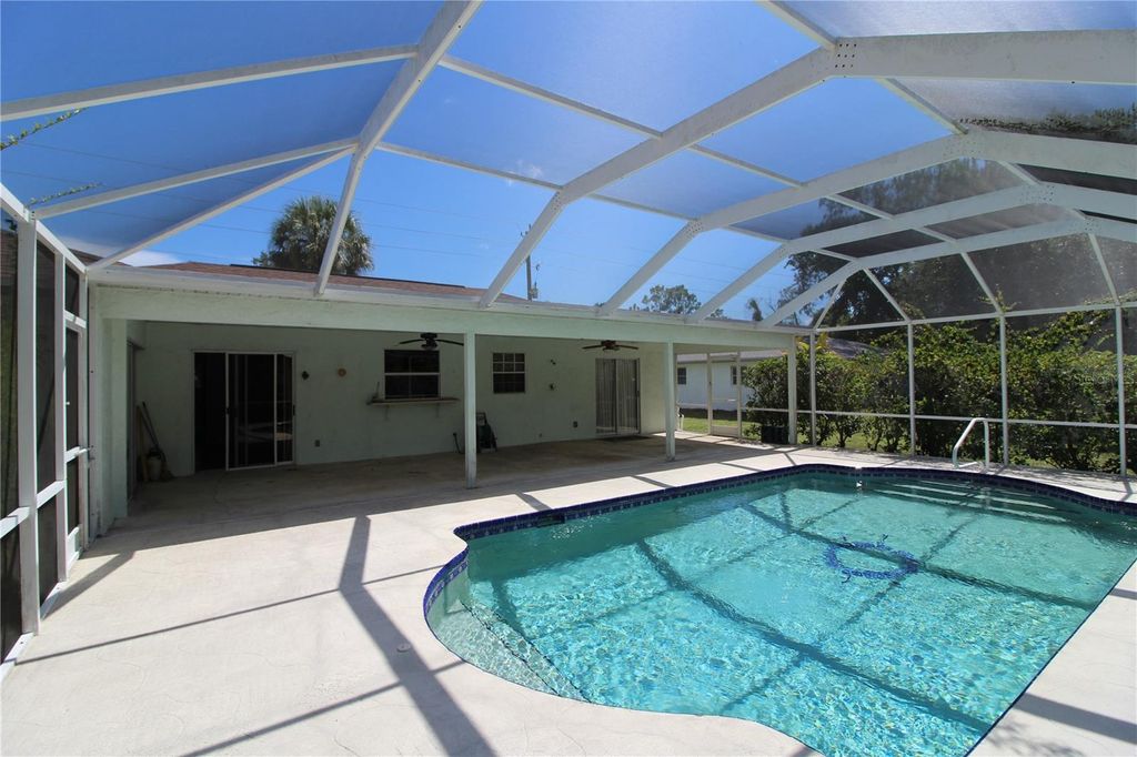 Photo of 21466 Quesada Avenue, Port Charlotte, FL 33952 (MLS # C7513188)