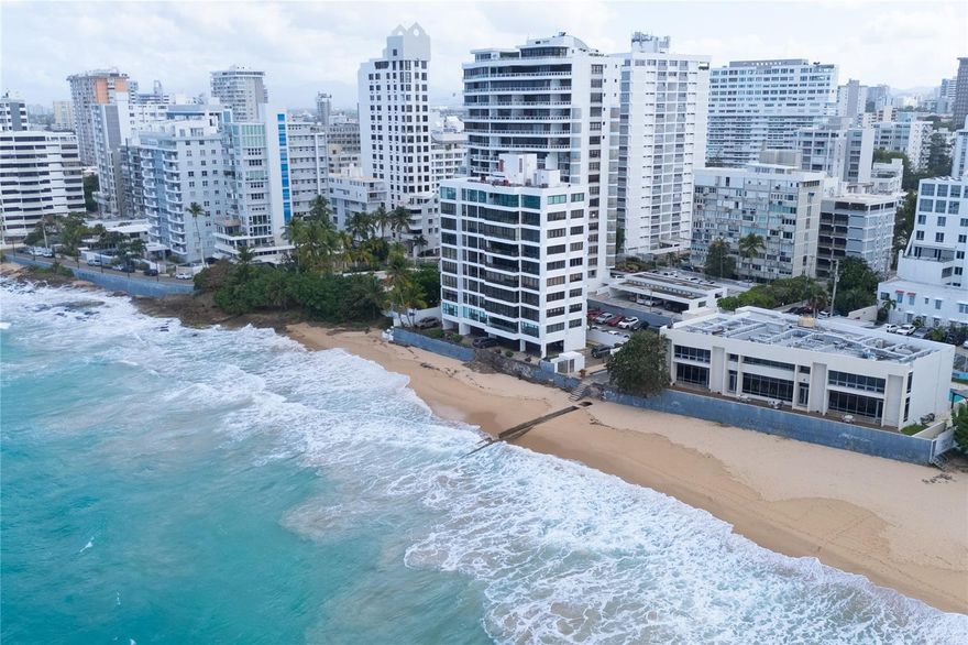Located in Cervantes I, Condado, this exceptional penthouse offers approximately 3,200 square feet of interior living space with unobstructed 180-degree ocean views. Sold fully furnished and turnkey, the residence is designed for immediate occupancy and effortless coastal living. The layout features four generously sized bedrooms, five full bathrooms, and a flexible entertainment room that can also function as a home office. Expansive living and dining areas are filled with natural light and oriented to maximize the panoramic ocean backdrop throughout the home. Two dedicated parking spaces are included. HOA: $1,750 monthly. CRIM (Property Tax): $5,535.84 annually.