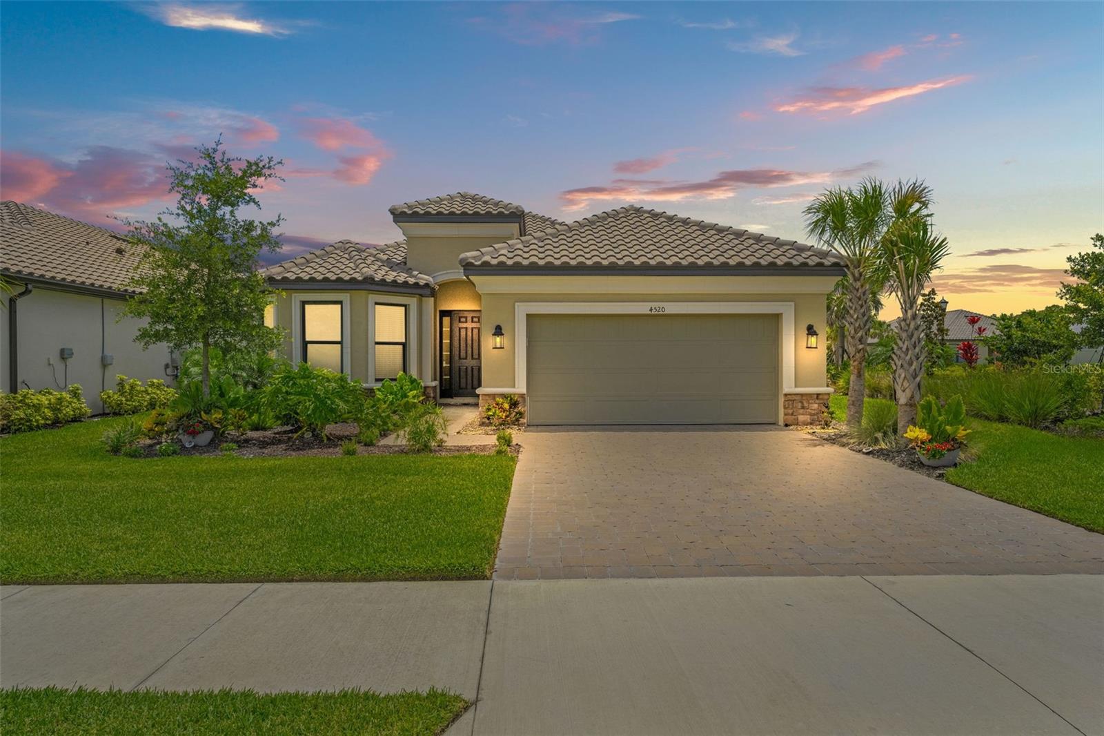MOVE-IN READY LAZIO MODEL WITH PRIVATE POOL IN ESPLANADE AT WIREGRASS RANCH – 55+ RESORT-STYLE COMMUNITY
Located in the highly sought-after Esplanade at Wiregrass Ranch, this stunning northwest-facing Lazio model by Taylor Morrison sits on a prime corner lot and offers a true Florida lifestyle with a private pool surrounded by tropical landscaping. Situated in one of Wesley Chapel’s most sought-after 55+ gated communities, this home combines high-end finishes, premium upgrades, and low-maintenance living in a luxurious resort-style setting.
With 2,403 sq. ft. of thoughtfully designed living space, this home features 3 bedrooms, 3 full bathrooms, a private study, and a 2-car garage. The open-concept floor plan showcases a warm and inviting layout, including a welcoming foyer, formal dining area, and a bright, spacious gathering room—perfect for everyday living and entertaining.
The gourmet kitchen features a large center island, plenty of cabinets, and high-end Bosch stainless steel appliances, combining practicality with style. Next to the kitchen, the casual dining area and great room flow effortlessly to the expanded covered lanai, creating an ideal indoor-outdoor connection. Outside, enjoy your screened backyard, private pool with the soothing sound from the waterfalls, and lush tropical landscaping—a personal retreat perfect for entertaining or relaxing in the Florida sun.
Highlights Include:
High-end Bosch stainless steel appliances.
Brand-new washer and dryer included.
Furnishings negotiable.
No repairs needed – this home is truly turnkey.
Private pool with screened-in lanai and tropical landscaping
Relaxed, low-maintenance living with resort-style amenities
Upgrades:
Bay window in the primary suite
Extended covered lanai
Outdoor kitchen rough-in
Dedicated study/home office
The primary suite is a peaceful retreat featuring dual vanities, an oversized walk-in shower, a private water closet, and a large walk-in closet with ample storage space.
Community Lifestyle:
Residents of Esplanade at Wiregrass Ranch enjoy access to a wide array of resort-style amenities, including:
Clubhouse and fitness center
Spa services and wellness programs
Resort-style pool
Tennis and pickleball courts
Scenic walking trails
Full-time on-site lifestyle manager
Curated calendar of social events including wine tastings, live concerts, dining experiences, fitness classes, and more
Don’t miss this rare opportunity to own a fully upgraded pool home in one of the most exclusive 55+ communities in Wesley Chapel.
Schedule your private showing today—this home will not last!