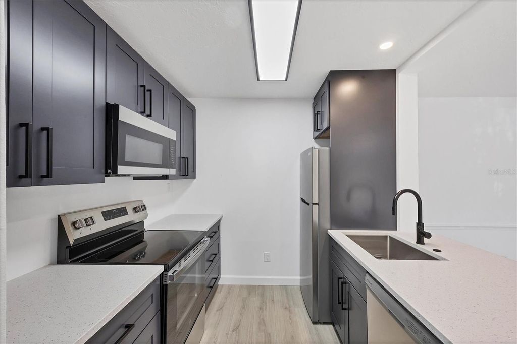 Photo of 4008 Crockers Lake Boulevard #11, Sarasota, FL 34238 (MLS # A4666434)