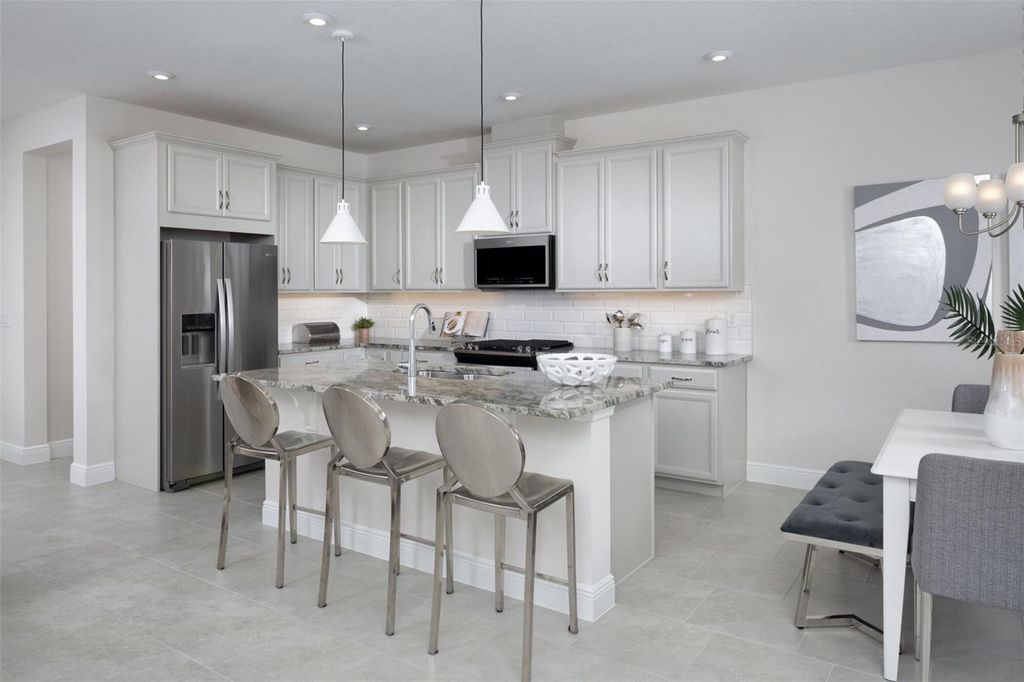 Photo of 1883 Seawall Way, Celebration, FL 34747 (MLS # O6349371)