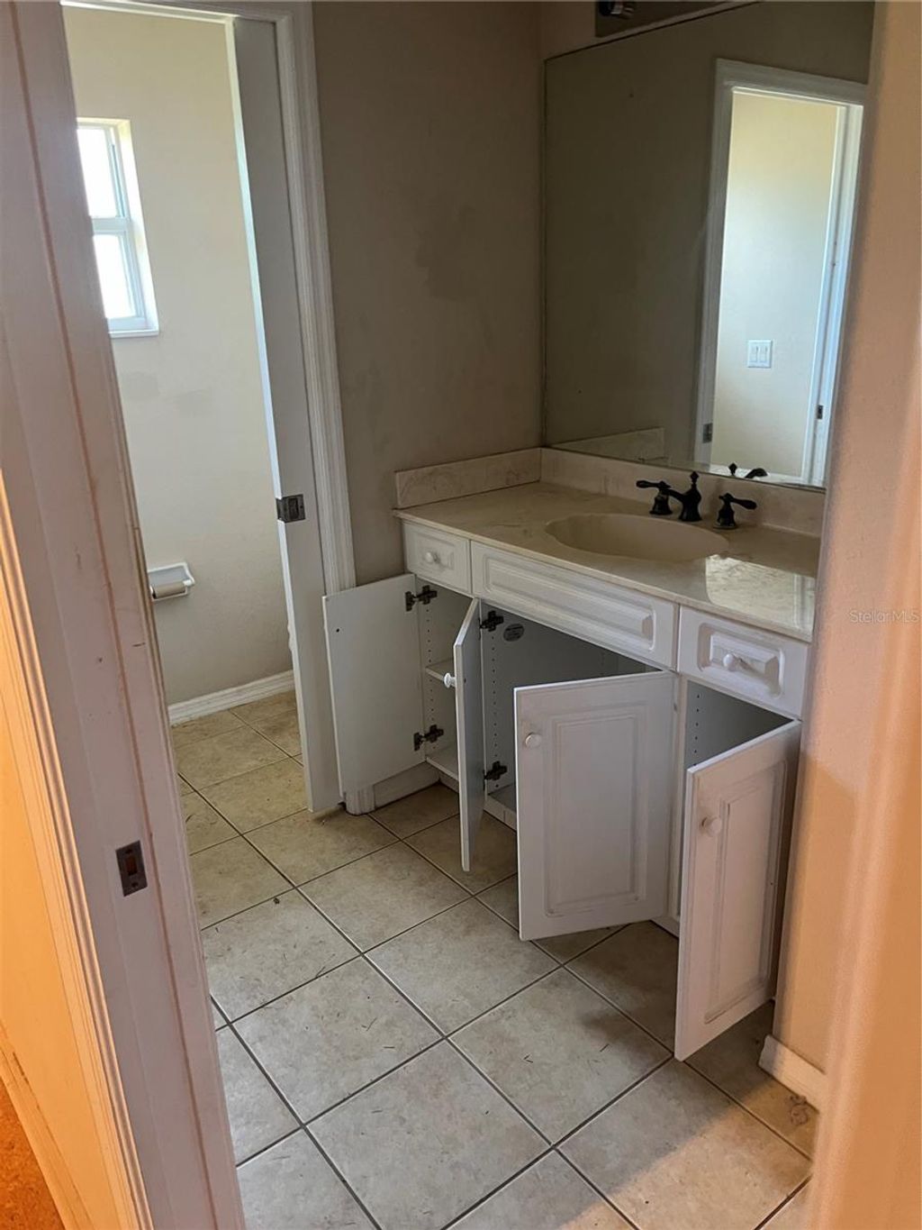 Photo of 1109 Chaplin Avenue, Lehigh Acres, FL 33971 (MLS # TB8417509)