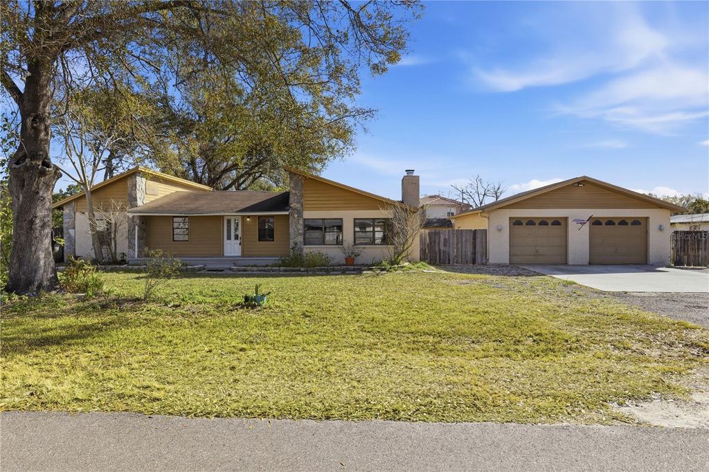 Photo of 10301 Trail Ridge Lane, Tampa, FL 33624 (MLS # TB8468159)