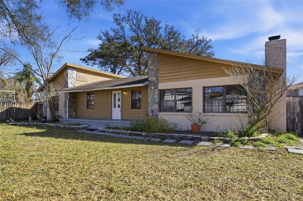 Photo of 10301 Trail Ridge Lane, Tampa, FL 33624 (MLS # TB8468159)