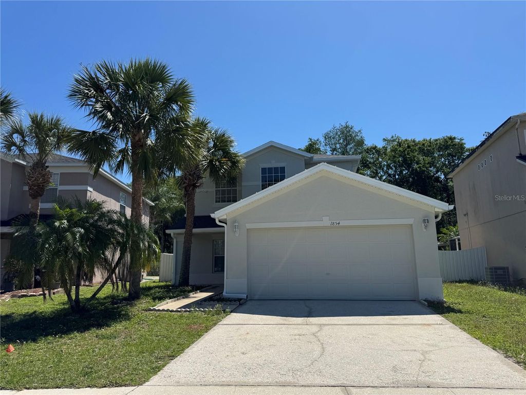Photo of 1854 Meadow Pond Way, Orlando, FL 32824 (MLS # O6426048)