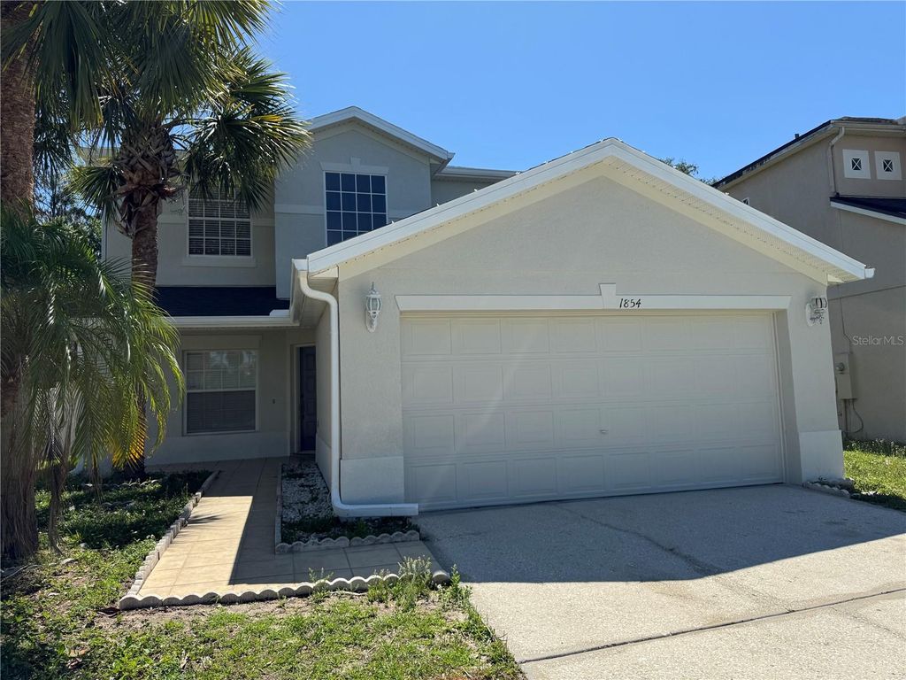 Photo of 1854 Meadow Pond Way, Orlando, FL 32824 (MLS # O6426048)
