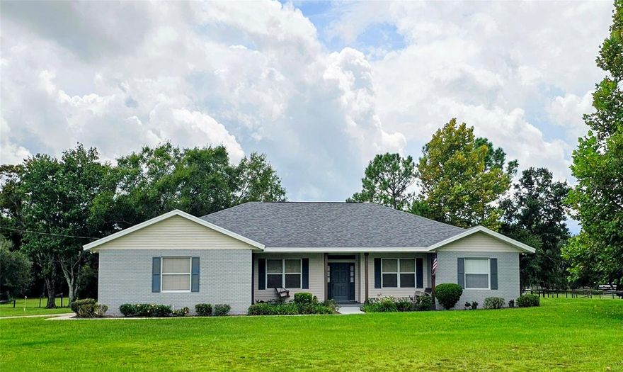 Discover the perfect blend of country living and modern convenience with this well-maintained property set on over 5 acres. This spacious home offers 3 bedrooms plus a dedicated office, 2 full baths, a welcoming living room, formal dining room, and a bright kitchen with a breakfast nook. Step outside to your own private retreat featuring a screened pool, ideal for relaxing or entertaining.  Equestrian enthusiasts will appreciate the horse barn along with fenced and cross-fenced pastures, providing plenty of space for animals. The property combines privacy and wide-open views with easy access to city amenities, shopping, and schools. With its well-cared-for condition and versatile layout, this home is move-in ready and waiting for you to enjoy the best of both worlds—peaceful country living just minutes from town.