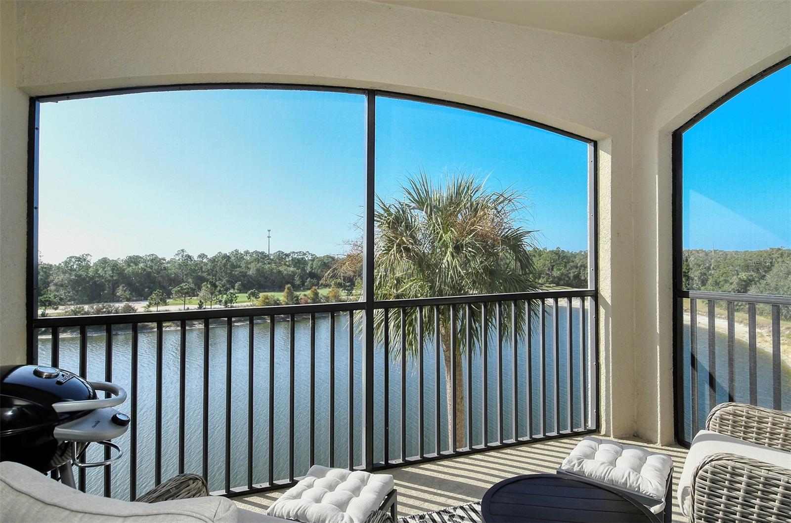 Available off-Season months at $3,000/month, and April 2025 at $5500. Lakewood National Golf Club!! This beautiful 2Bed/2Bath turnkey condo is located on the top floor. It features a bright open floor plan, kitchen with stainless steel appliances, breakfast bar and additional eating area overlooking the lake, and separate formal dining area. Spacious Master Suite with walk-in closet, double closet and en-suite bathroom with single vanity and walk-in shower. The 2nd Bedroom across the hall has a hallway bathroom with tub. Inside Laundry closet with Washer/Dryer and extra storage. Relax and enjoy your morning coffee on the covered/screened Lanai, or evenings with a glass of wine, while taking in the amazing views of the lake and the 12th hole of the Commander Golf Course. There is an elevator, and the Condo includes an assigned covered parking spot in front of the building, plus, plenty of guest parking, and the Satellite Pool is just steps away. Lakewood National Amenities include a Grand Clubhouse with restaurant and bar, state of the art fitness center, resort style beach entry lagoon resort swimming pool with outdoor grille tiki bar and poolside cafe/service, a full-service spa, tennis courts, bocce ball and more! Golf/Membership transfer available, expenditure is required at the on-site Tiki Bar/Restaurant (Alcohol Excluded), tennis courts, pickleball, and much more! The Club has full-time, on-site trainers and professionals for golf, fitness, and racquet sports to help you reach your sports and fitness goals. Lakewood National is synonymous with luxury and is simply one of the best luxury golf communities in all of Florida! **HOA APPLICATION/TRANSFER FEE $600+tax