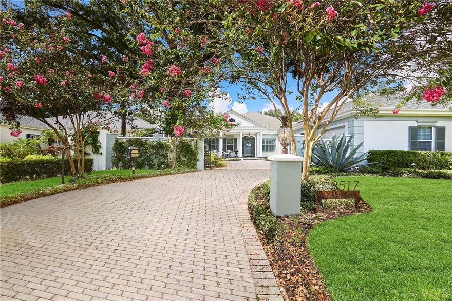 Exquisite mediterranean style pool home on .36-acre lot located in Golf View Estates in the heart of South Tampa. This privately gated single-story block residence has 5 bedrooms, 5.5 baths and offers 4,394 square feet of living space and includes a 3-car garage with extended paver driveway to accommodate multiple vehicles. As you enter you will notice the elegant finishes and attention to detail. The grand entry features silver leaf painted ceiling, tray lighting, mirror wainscoting and glass blown light chandeliers. The inviting formal living room offers large windows, wood floors and gas fireplace with marble surround. The formal dining room is spacious and welcoming with tray ceilings, recessed lighting, wainscoting, cherry rail, crown molding, wall sconces, chandelier and pocket door leading to the kitchen. A powder room off of the foyer/hall is a work of art with intricate detailing including a backlit hand painted sink and upholstered wallpaper. The luxurious kitchen features industrial 6 burner gas stove, KitchenAid refrigerator, stone counters, 48-inch wood cabinets, island with additional prep sink, walk in pantry, and built in desk workspace. A dinette opens to the separate wet bar off of the kitchen with glass shelving, wine/beverage refrigerator, sink, ice maker, and bar area seating. The large great room with vaulted ceilings, surround sound, built in features and double sets of glass French doors offers unobstructed views of your outdoor pool oasis. Each bedroom includes their own en suite bathroom for additional privacy with a 3-way split floor plan-One bedroom with private exterior entry. The elegant primary bedroom spares no expense and includes extensive woodwork with French doors leading to the pool area, double walk-in closets with shelving systems, tray ceilings and gorgeous en suite bath. The primary bathroom exudes elegance with double vanities that boast painted artistic Kohler sinks, separate soaker tub and luxurious walk-in shower with double shower head, bidet, antique sconces, crystal and brass bath fixtures, and other remarkable features. Additional upgrades of this home include: 8-foot solid wood doors, plantation shutters, NEW exterior paint 2024, wood/stone/tile flooring (No carpet), premium lighting and water fixtures, concrete privacy wall with electric wrought iron gate entry, water softener, and home theater system. The oversized yard (.36 acres) is fully fenced and offers privacy with extensive green space. The heated pool and jacuzzi are surrounded by pavers and mature landscaping. Additionally, you will find a spacious covered patio area with stone flooring and ceiling fans, perfect for entertaining. NO FLOOD INSURANCE REQUIRED. Located in the Plant HS District and just minutes from Tampa’s premier dining, shopping, downtown, beaches, hospitals, and more, this home is a masterpiece with timeless elegance and attention to detail.