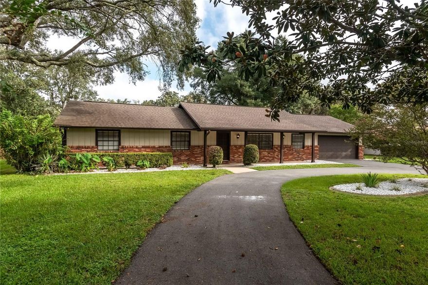 Well kept quintessential neighborhood home, with huge magnolias, circular drive and large fenced back yard. This three bedroom, two bathroom ranch home offers plenty of storage and traditional living spaces including dining room, living room and a family room with fireplace (decorative only). The kitchen with breakfast bar is open to the family room and is central to the dining room, laundry room and garage. A screened porch makes for pleasurable outdoor living, overlooking the spacious fenced yard with a large wood deck for sun lounging. The primary bedroom features an en-suite with a walk-in shower. Two additional bedrooms share a guest bathroom, conveniently located in the
hall. Additionally, this home has no carpet and extra cabinets in the garage. Desirable location, close to Publix, Starbucks, YMCA, parks. medical and more.