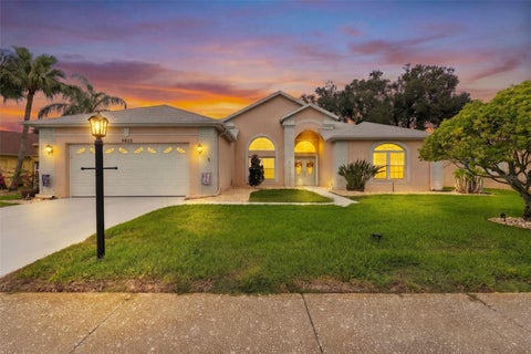 Photo of 6623 Garden Palm Court, New Port Richey, FL 34655 (MLS # TB8562817)