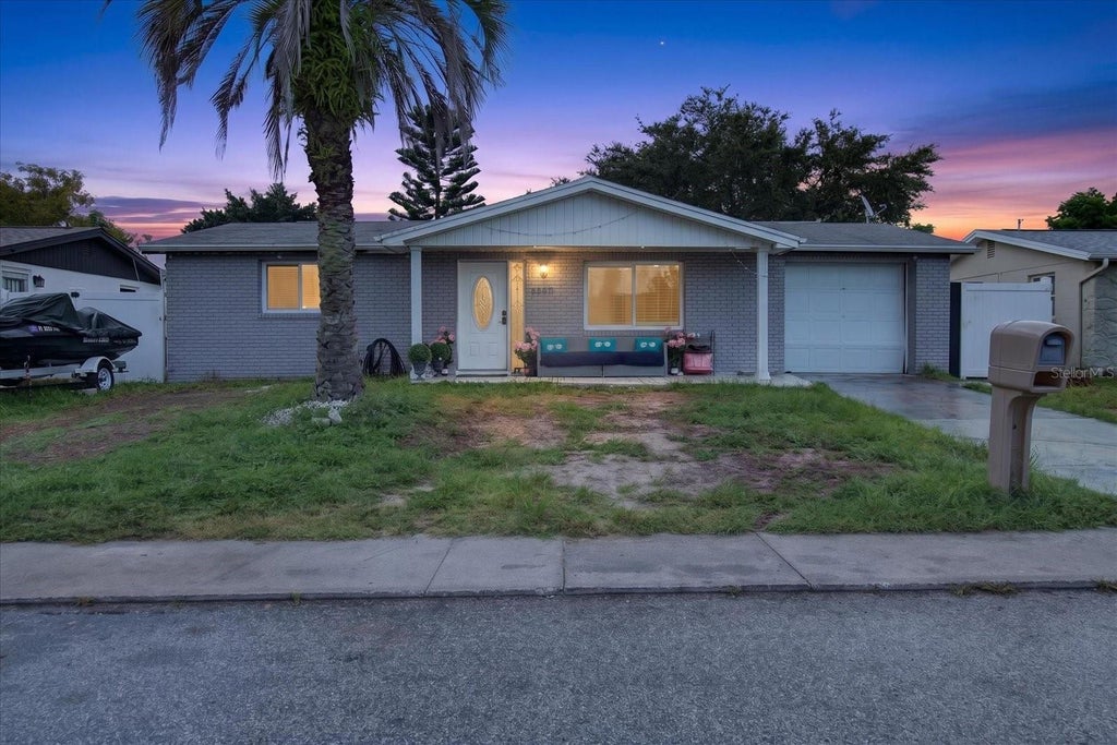 Photo of 9440 Rainbow Lane, Port Richey, FL 34668 (MLS # TB8544392)