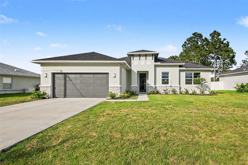 Photo of 12 Lansing Lane, Palm Coast, FL 32137 (MLS # TB8513612)