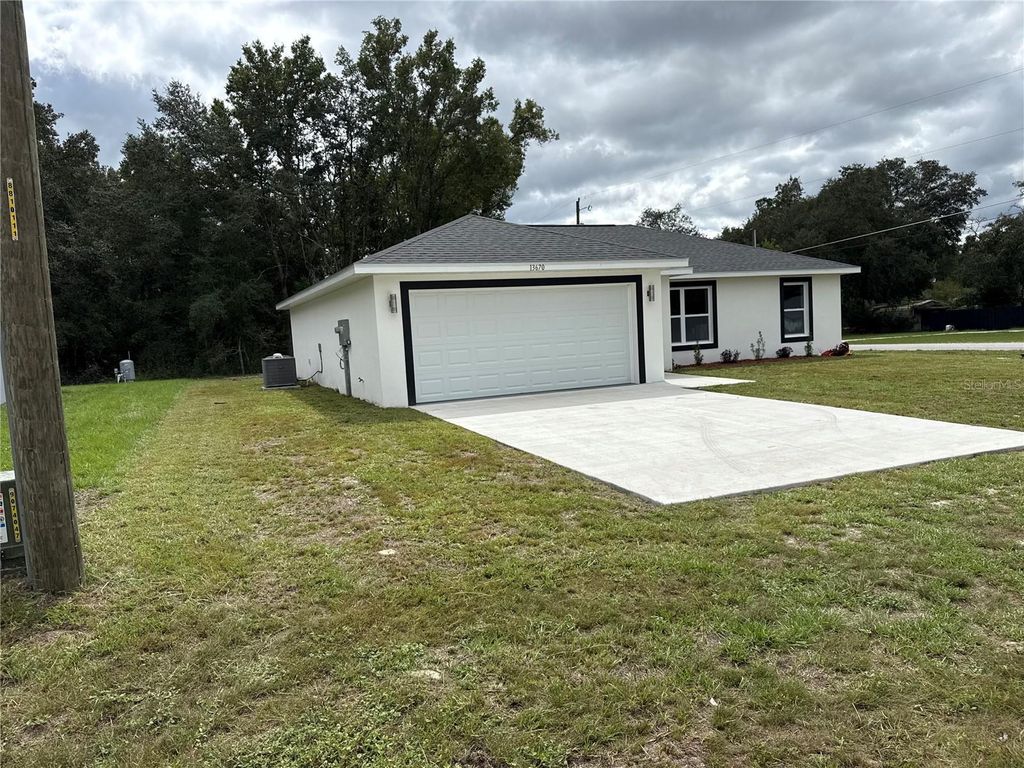 Photo of 13670 SW 113 Place, Dunnellon, FL 34432 (MLS # TB8423168)
