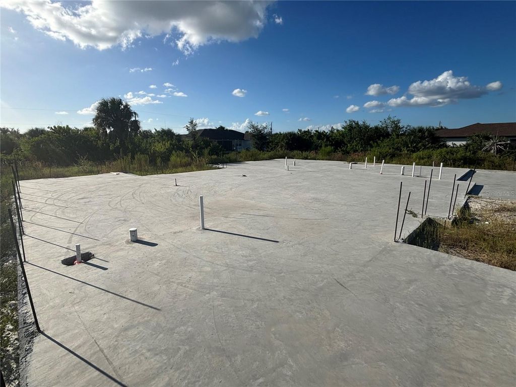 Photo of 10031 Sunday Drive, Port Charlotte, FL 33981 (MLS # TB8443593)