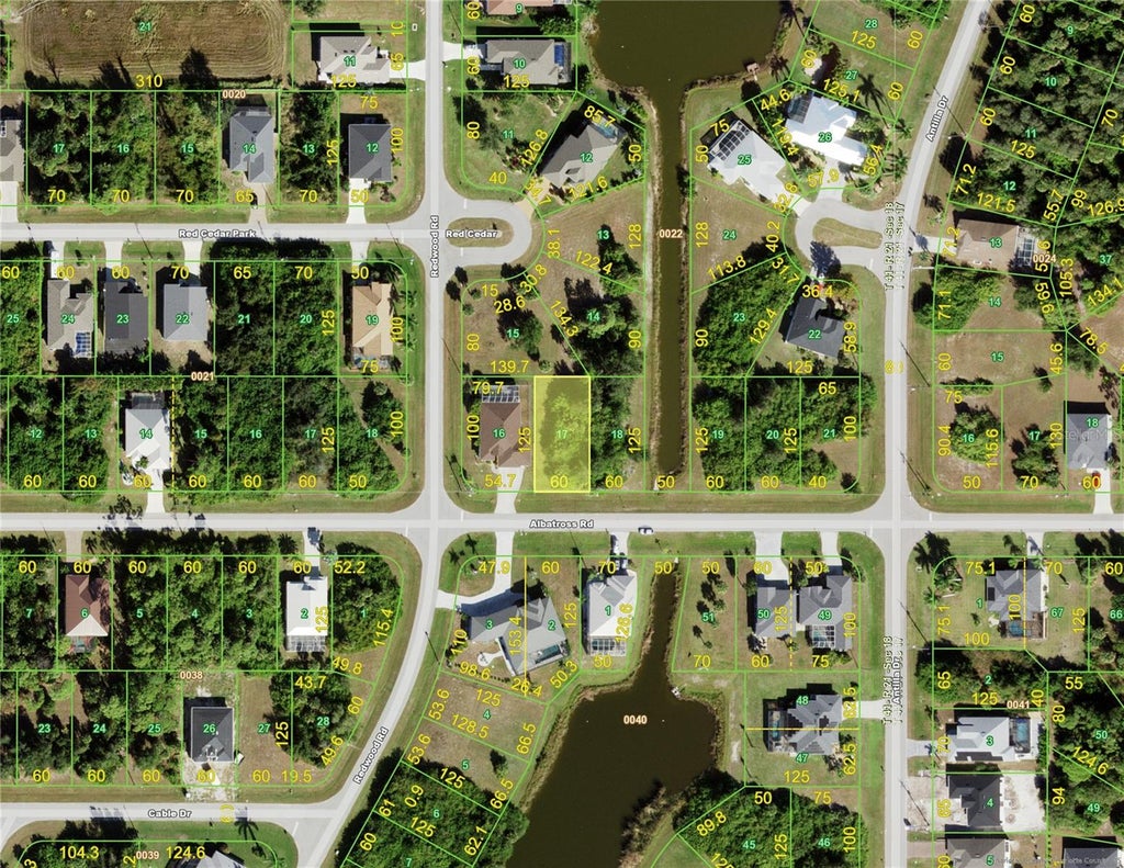 Photo of 402 Albatross Road, Rotonda West, FL 33947 (MLS # D6148616)