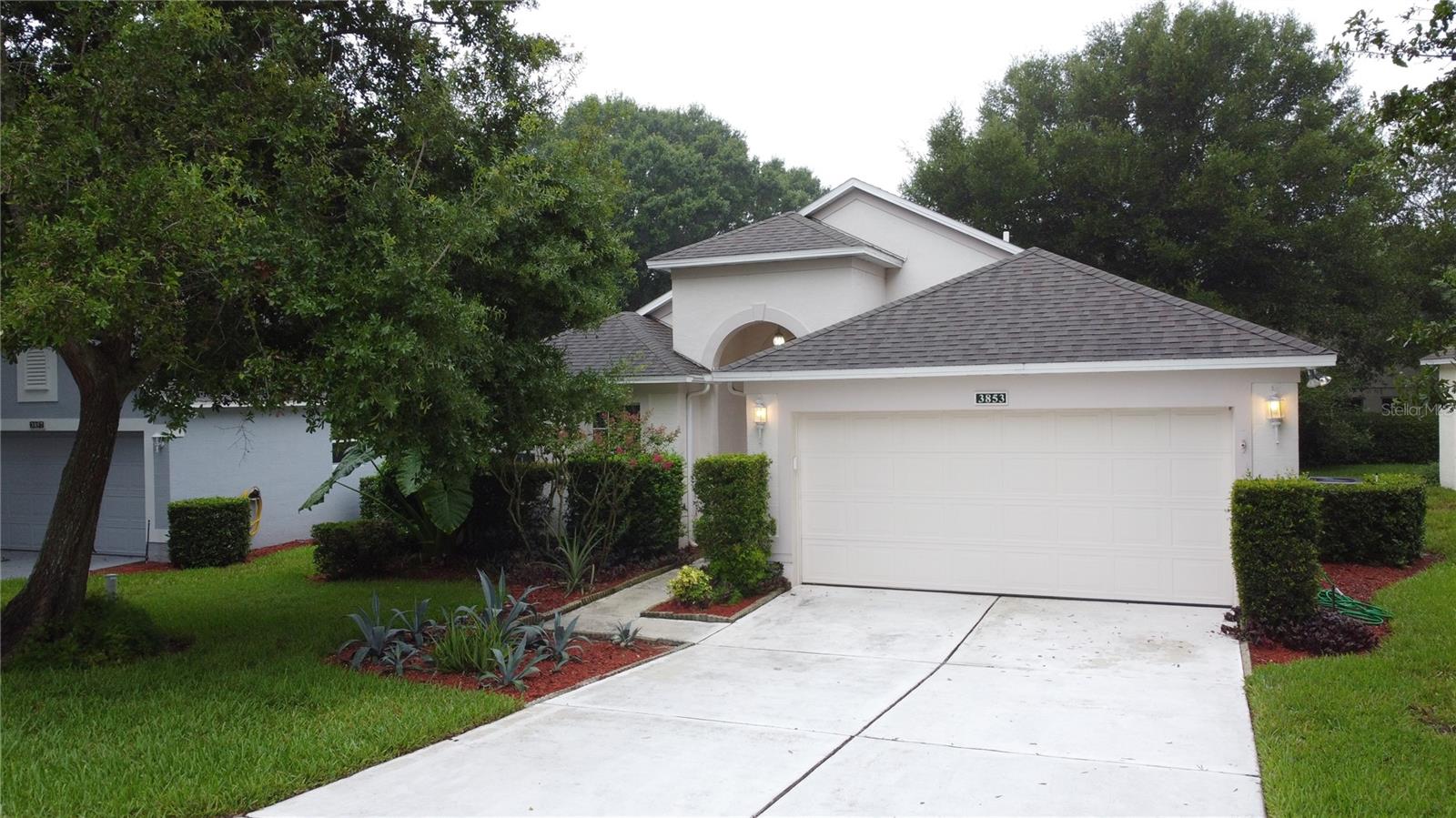 Sherwood model located in 55+ Kings Ridge in the rolling hills of Clermont. Home has 1366 SF with 2 BD/2 BA, and a 2 car garage. The entire inside of the home as just been freshly painted including all baseboards & doors. The great room has cathedral ceilings. Roof change out in July 2015. The kitchen has granite countertops, stainless appliances and tile flooring. New light fixture in Dining room area of the Great room. The 2nd Bath was completely renovated -new walk in shower, vanity, toilet, lighting and ceramic tile. The Primary Bathroom has new shower door, countertop w/sink and a new toilet. There is a separate laundry room and washer and dryer remain with home. Newly painted epoxy garage floor & walls plus a brand new water heater. The back lanai has tile flooring and vinyl windows. Kings Ridge is a 55 Plus gated golf community located in the rolling hills of Clermont, FL. Enjoy the Royal life style in the multi-million $ clubhouse with 3 heated pools, spas, tennis & pickle ball courts, billiards, shuffle board, shows, Bingo, cards and clubs galore. The monthly maintenance fees include: lawn maintenance including trimming of shrubs, care of irrigation system & irrigation water, internet, TV & home phone thru FiberOne, maintenance of roads and outside painting of home every 7 years. Take your golf cart to the Kings Ridge Plaza where you can do your grocery shopping, banking or dine out.