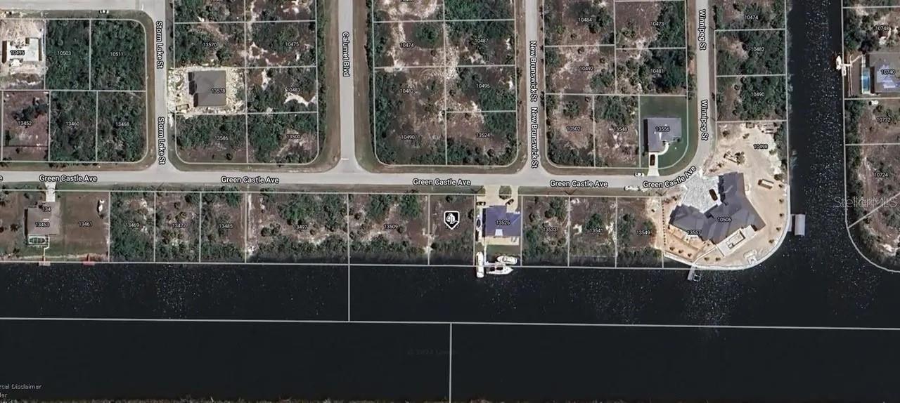 fantastic lot on great street. sailboat access direct on spreader canal