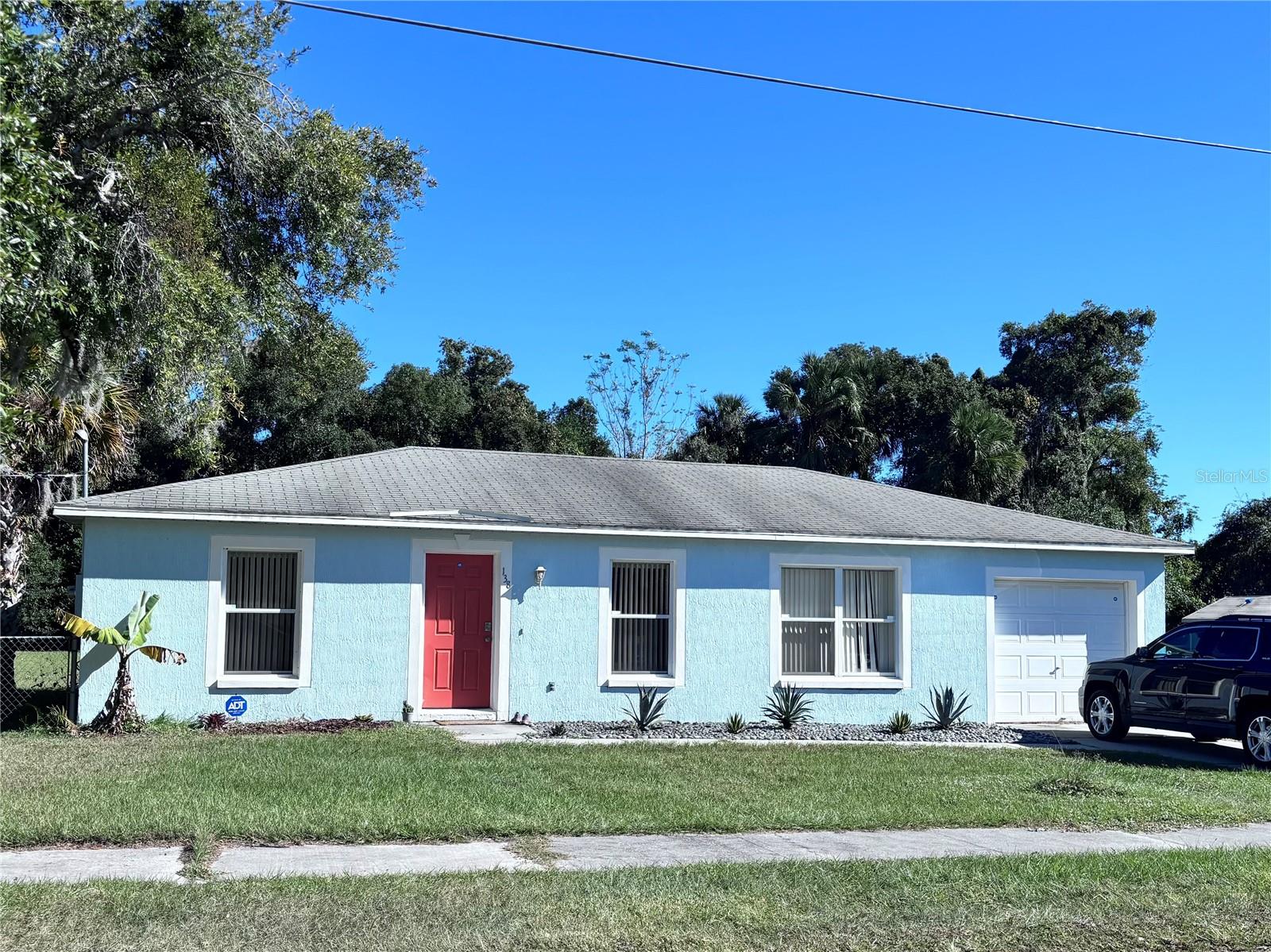 This home is just minutes from UCF, Siemens, Oviedo on the Park, A-rated public schools, a hospital, the Oviedo Mall, the Oviedo library, and so much more. Save oodles of time living right near the center part of town while still enjoying a big, fenced-in back yard - almost 1/2 an acre where you can garden, run, and play. This 2 bedroom 2 bath home has a newer roof and AC and is connected to sewer, so you can weather the weather with ease. The newly renovated bathrooms are sleek, and there is no carpet, so keeping things tidy is a breeze.