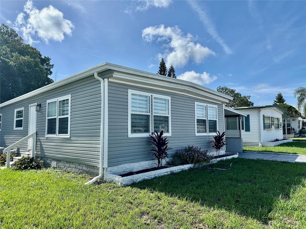 Photo of 2326 Prestige Drive, Holiday, FL 34690 (MLS # W7876470)