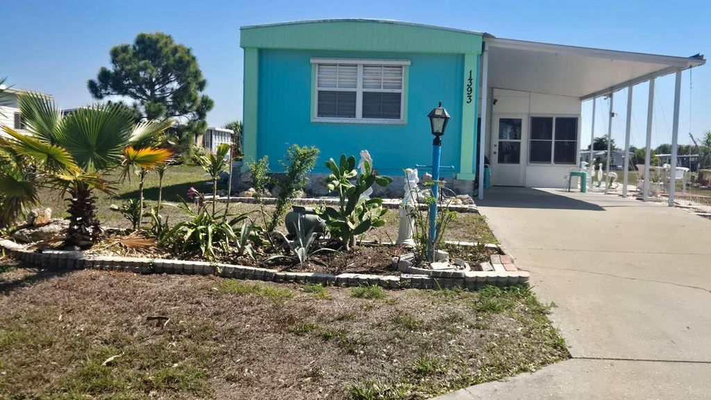 Photo of 1393 Mallard Drive, Englewood, FL 34224 (MLS # D6146808)