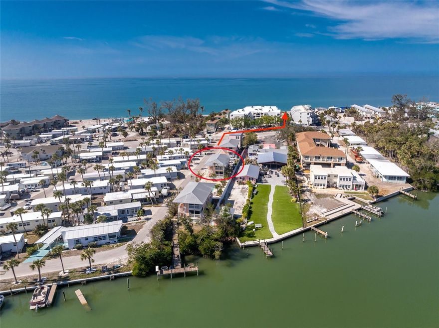 INVESTOR ALERT — Highly occupied, TURN-KEY unit with property manager available AND a 5-STAR LISTING WITH RAVE REVIEWS ready to transfer for IMMEDIATE INCOME. 75 turnovers in 2025 with OVER $83,000 in gross income!!! SLEEPS 6! Featuring a HEATED COMMUNITY POOL, COMMUNITY DOCK, and DEEDED BEACH ACCESS, these units are PRIME INCOME-PRODUCING PROPERTIES with NO RENTAL RESTRICTIONS. This TURN-KEY FURNISHED property showcases UPGRADED FLOORING, CABINETS, and COUNTERTOPS, NEWER APPLIANCES, FRESH PAINT, NEW HVAC, and a NEWER HOT WATER HEATER, all complemented by GORGEOUS VIEWS of the pool and the Intracoastal Waterway. Designed with an OPEN FLOOR PLAN and ABUNDANT WINDOWS, the space is filled with NATURAL LIGHT and offers comfortable areas for relaxing and entertaining. The galley kitchen includes everything needed for a seamless stay, with a BREAKFAST BAR overlooking the dining area, living room, and LARGE SCREENED LANAI, plus a private washer/dryer closet. The PRIMARY BEDROOM features a Sealy KING mattress, the guest bedroom offers a QUEEN, and the living room includes a QUEEN pull-out sofa, comfortably accommodating six guests. FURNITURE AND LINENS WERE RECENTLY PURCHASED, with multiple sets included for easy rental turnovers, and future bookings may be transferred to the next owner. Located on Manasota Key in Englewood, this charming island destination offers nearby marinas, golf courses, boat and jet ski rentals, guided kayak tours, and more. Devine’s Turtle Bay is a boutique condominium association of just four buildings and eight units, and CONDO FEES INCLUDE BUILDING AND FLOOD INSURANCE. Situated next to Magnolia’s on the Bay and within walking distance to restaurants, live music, shopping, and the public beach, this is truly a SUPERIOR LOCATION FOR VACATION RENTERS. Call for details before this opportunity slips away. VIDEO TOUR AVAILABLE HERE: https://www.dropbox.com/scl/fi/6apqjtj323o8myl54ucgr/2375-N-Beach-Rd-2B-unbrandedVIDEO.mp4?rlkey=0gykjey7o5tu9s4ff9dqaaugh&st=e6x3ysce&dl=0