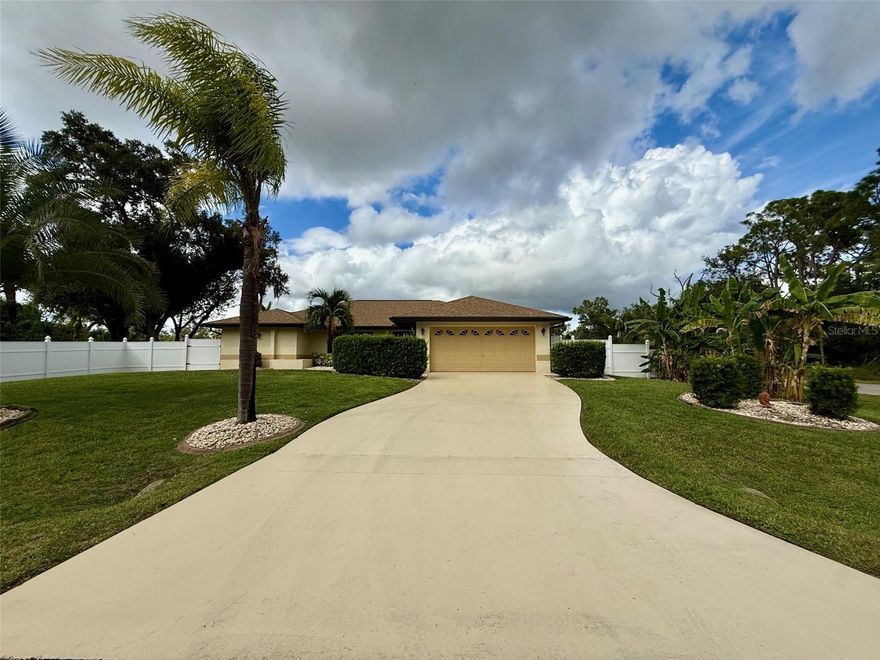 Available for ANNUAL rental in a quiet part of Port Charlotte is this move in ready POOL HOME ON A *FULLY FENCED* HALF AN ACRE! This home is fully fenced with a VINYL PRIVACY FENCE SURROUNDING THE ENTIRE PROPERTY. PET FRIENDLY (with owner approval). Spacious interior with over 2200 sq. ft. and a split concept with AN OVERSIZED PRIMARY BEDROOM ALLOWING PRIVATE ACCESS TO THE LANAI and 2 more guest rooms on the opposite side of the home. 2 full bathrooms (NEWLY REMODELED VANITIES) one of which doubles as a pool bath with access from the inside and from your lanai! HUGE SCREENED LANAI WITH POOL AND ADDITIONAL BRICK PAVER PATIO SURROUNDED BY HERITAGE OAK TREES! This property is stunning and you must see it for yourself! Lots of privacy! 2- CAR GARAGE! The kitchen features GRANITE COUNTERTOPS AND STAINLESS STEEL APPLIANCES! All bedrooms have WALK IN CLOSETS. Both bathrooms have WALK IN SHOWERS! Call today for the full scoop and for a private showing!