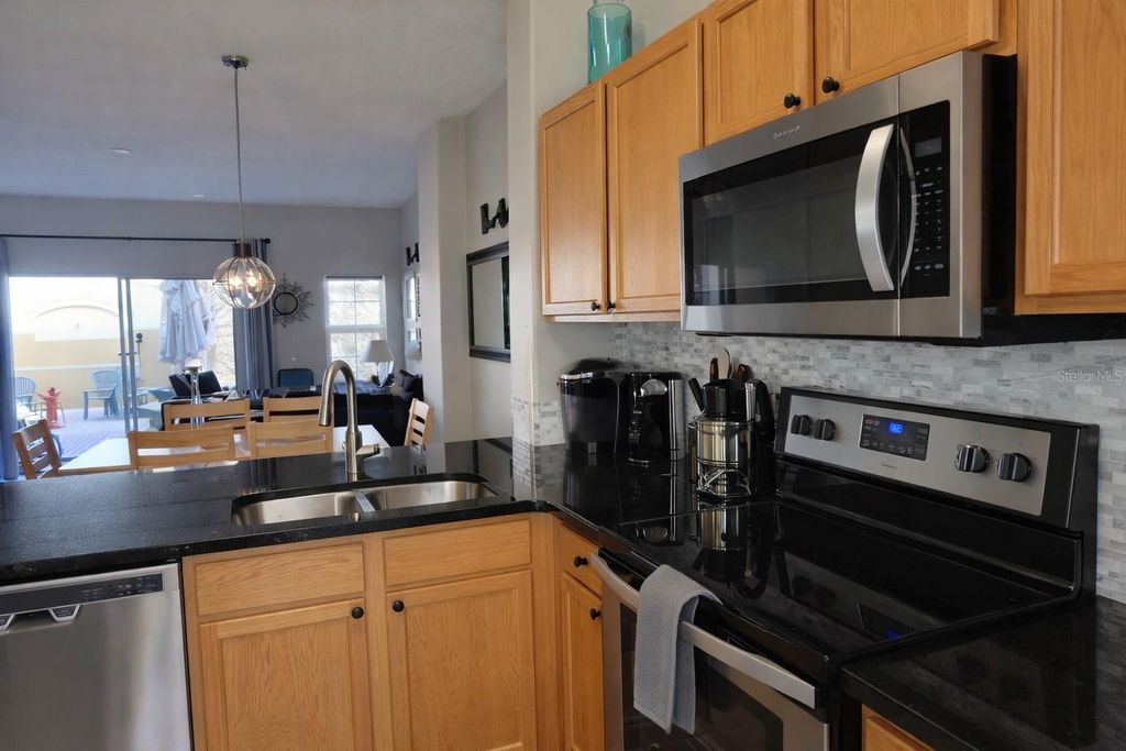 Photo of 125 Pompano Beach Drive, Kissimmee, FL 34746 (MLS # O6397873)