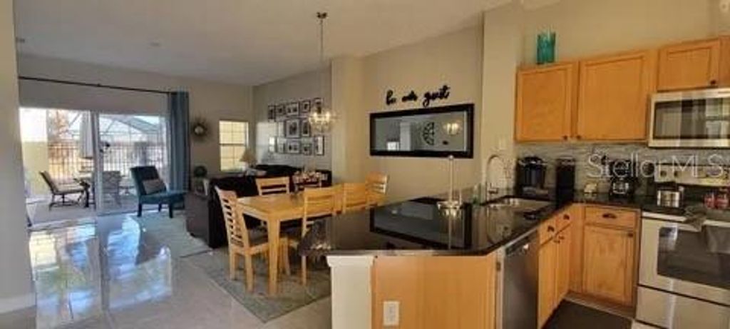 Photo of 125 Pompano Beach Drive, Kissimmee, FL 34746 (MLS # O6397873)