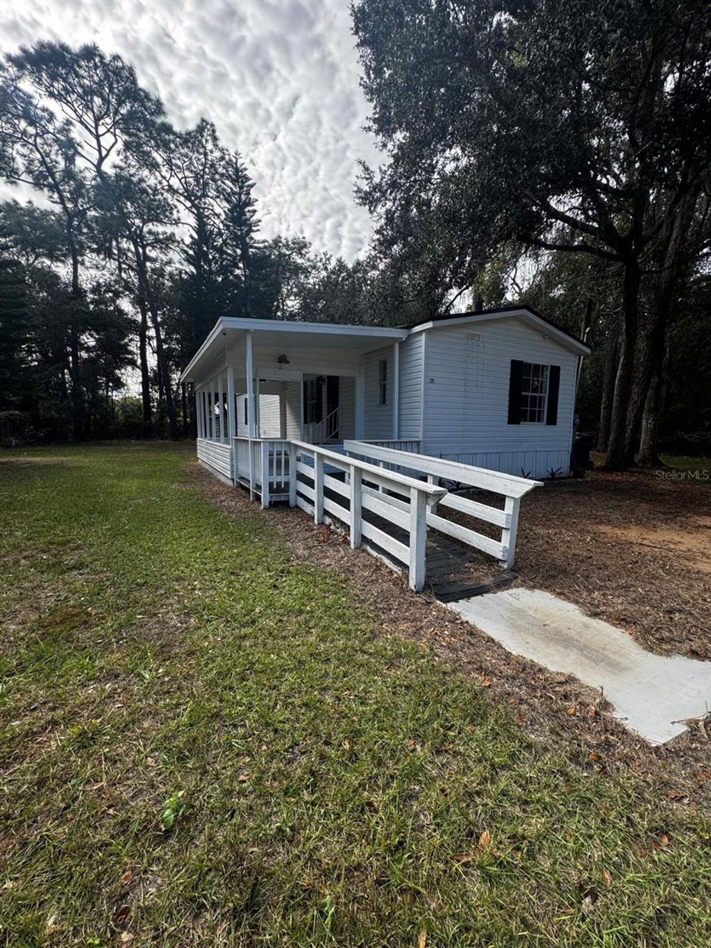 Photo of 120 3rd Wahneta Street W, Winter Haven, FL 33880 (MLS # P4937327)