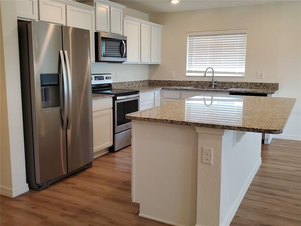 Photo of 16536 Centipede Street, Clermont, FL 34714 (MLS # O6404434)
