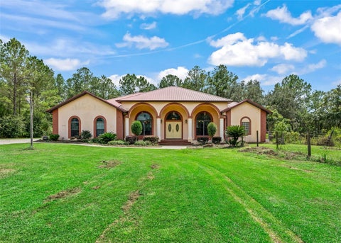 Photo of 10330 NW 28th Place, Ocala, FL 34482 (MLS # OM731808)