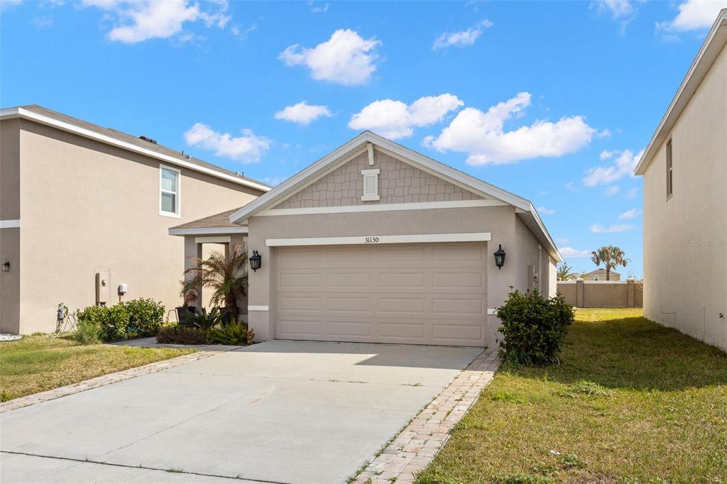 Photo of 31130 Penny Surf Loop, Wesley Chapel, FL 33545 (MLS # TB8485127)