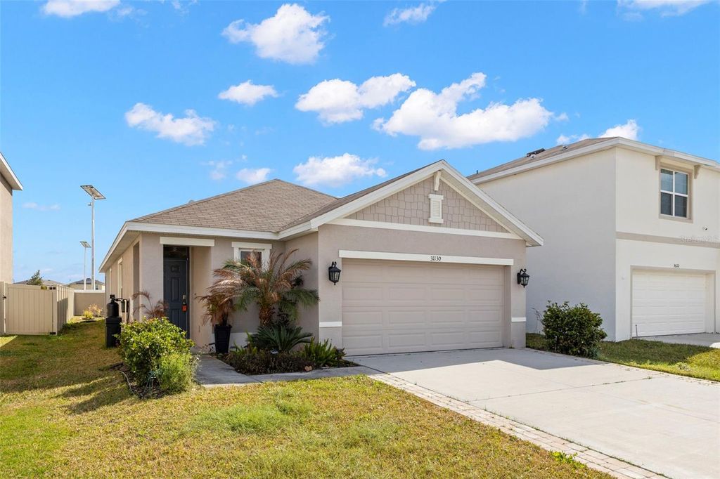 Photo of 31130 Penny Surf Loop, Wesley Chapel, FL 33545 (MLS # TB8485127)