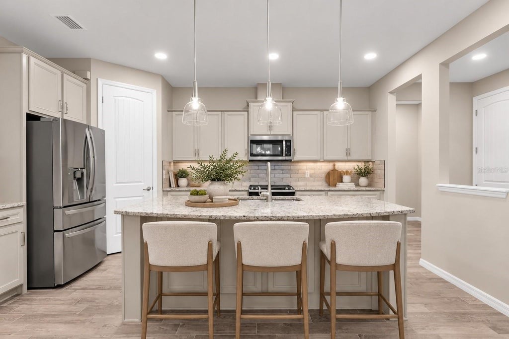Photo of 2122 Long Spur, Odessa, FL 33556 (MLS # W7890196)