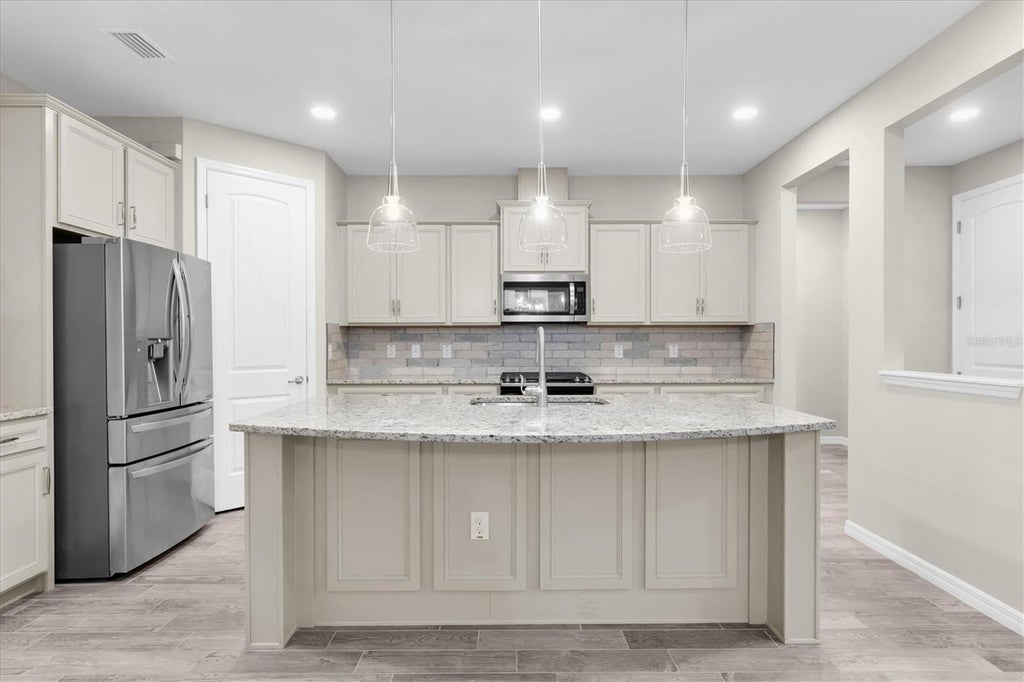 Photo of 2122 Long Spur, Odessa, FL 33556 (MLS # W7890196)