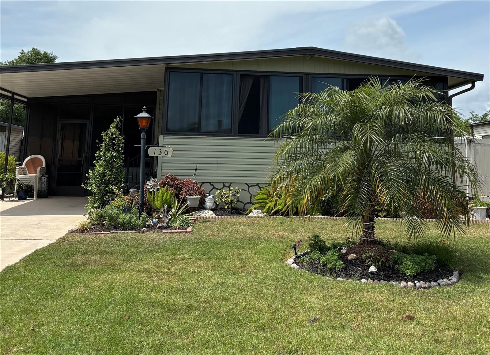 Live the River Life! Enjoy peaceful sunsets on the St John's River fish from the dock on the river's edge. This charming home features a 2/2 floor plan with Florida room, screen porch, and indoor laundry facilities that create a comfortable and functional living space. It's a short distance to the pool, clubhouse, and marina where this home's private or boat slip is located.
This home is climate controlled by a mini-split system, has a newer hot water heater, and a brand new - never used - dishwasher. There is plenty of storage space outdoors in both a storage room behind the screen porch and a backyard shed.
The community features a club house, marina, dock, swimming pool, shuffleboard court, and other amenities.