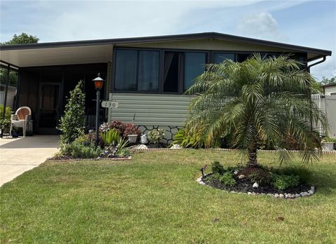 Photo of 130 Oak Tree Drive, Debary, FL 32713 (MLS # V4941900)