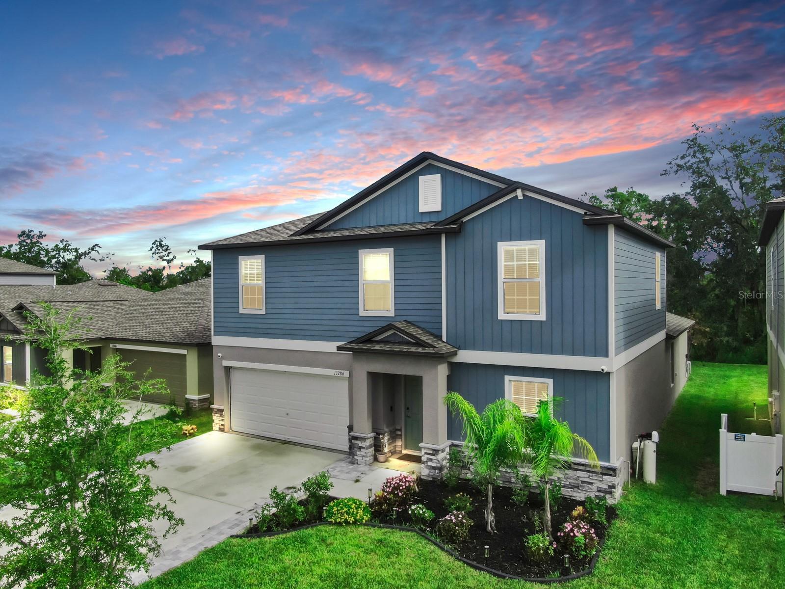 ***VA Assumable Loan at 4.5 interest with a gap under $10k!*** This stunning 5-bedroom, 2.5-bath home in Triple Creek offers nearly 3,000 sq ft of living space and was just built in 2024 with thoughtful upgrades, including stone siding on the front and an extended paver driveway. Inside, you’ll find a flexible front room perfect for a home office or extra living space, plus an open-concept kitchen with stainless steel appliances, a large island, and plenty of counter space—ideal for entertaining. The primary suite is located downstairs with a spacious walk-in closet and private bath, while upstairs offers four additional bedrooms with plenty of space for family, guests, or hobbies. Enjoy added privacy with no backyard neighbors. Triple Creek is loaded with amenities, including resort-style pools, a fitness center, parks, and walking trails—all with a low HOA of just $8.36/month. Between the upgrades and the assumable VA loan, this one is a rare find—schedule your showing today!