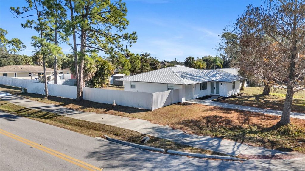 Photo of 2506 Lakeshore Circle, Port Charlotte, FL 33952 (MLS # C7520152)
