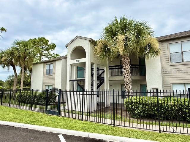 Photo of 2001 Cascades Boulevard #204, Kissimmee, FL 34741 (MLS # O6453354)