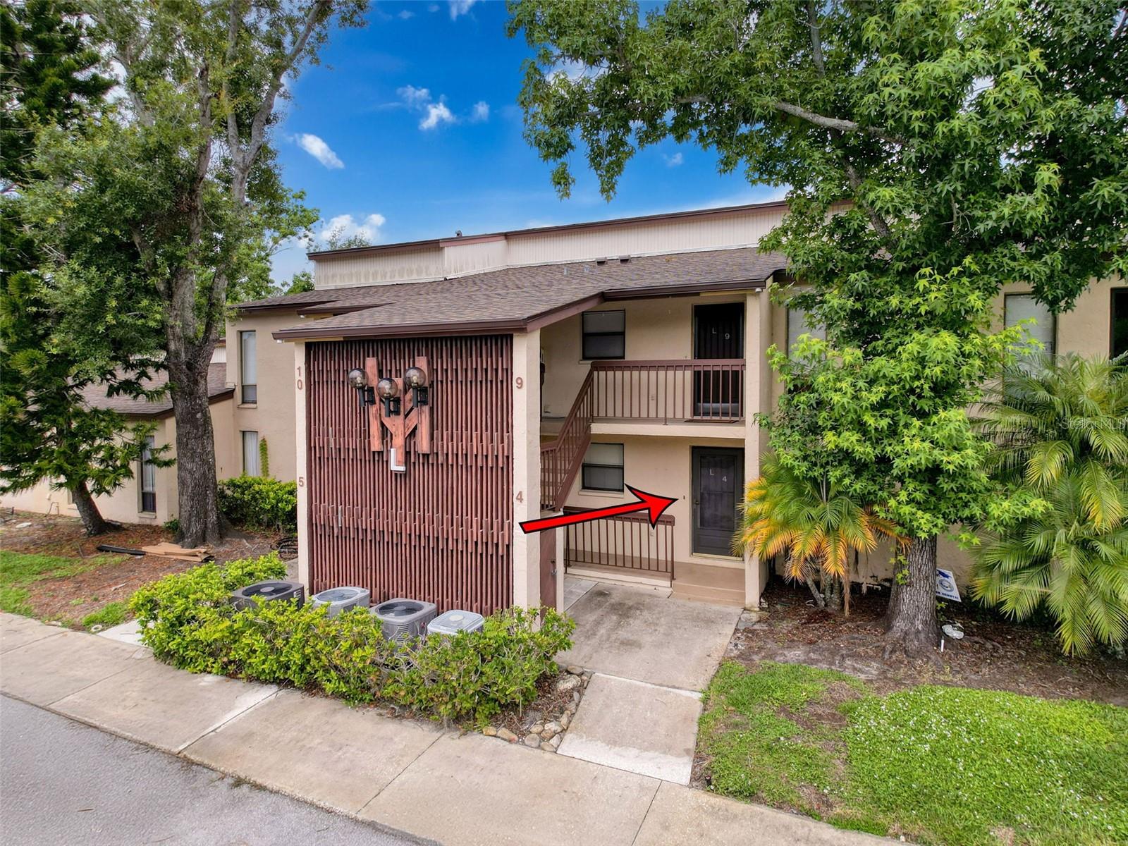 Opportunity Awaits! This first-floor 2-bedroom, 2-bathroom condo is full of potential and ready for your personal touch. Featuring an enclosed patio perfect for relaxing or entertaining, this home offers a functional layout, ideal for value-added updates or a light renovation. With a brand-new roof (2025) and AC system from 2021, the big-ticket items are already taken care of—giving you a solid head start. Enjoy a low-maintenance lifestyle with no exterior upkeep required and access to a community pool for year-round enjoyment.Conveniently located near parks, beautiful beaches, and a variety of shopping and dining options—this is the perfect spot for both full-time living or a vacation getaway. Bring your vision and make it your own!