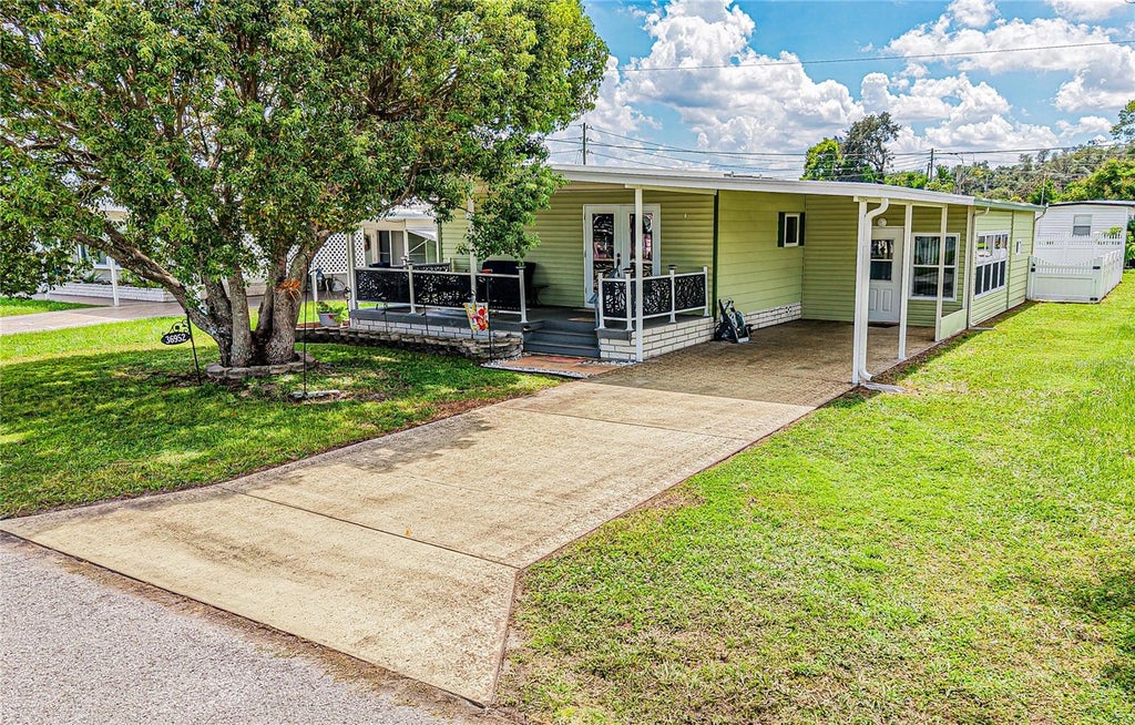 Photo of 36952 Grace Avenue, Zephyrhills, FL 33542 (MLS # TB8545300)