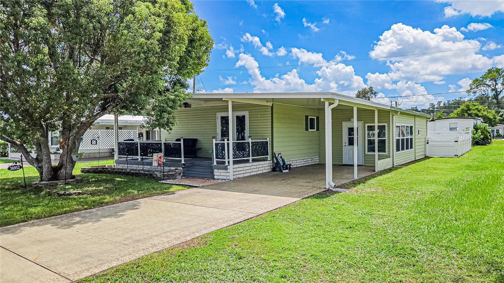 Photo of 36952 Grace Avenue, Zephyrhills, FL 33542 (MLS # TB8545300)