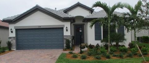 Photo of 17148 Hampton Falls Terrace, Bradenton, FL 34202 (MLS # A4669046)